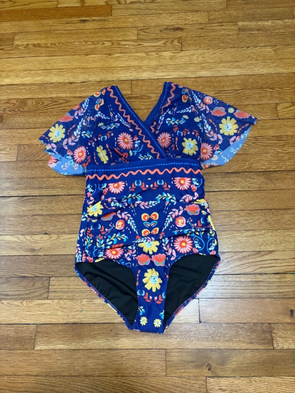 BLOOMCHIC Women’s Swimsuit Size 12 Blue Floral Short Sleeve Romper Style NWT